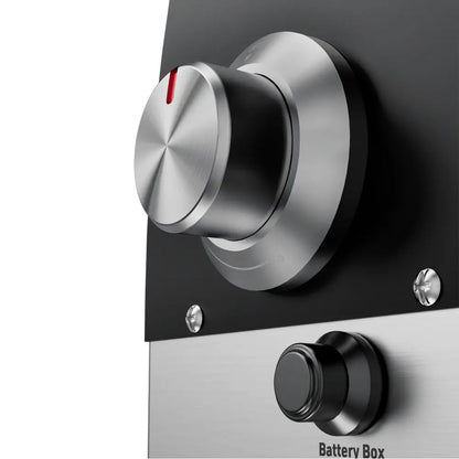 Close-up of a stainless steel control knob with a red indicator on the metallic panel of the Empava Wood Fired and Gas Fired (Dual Fuel) Pizza Oven by Empava, above a smaller black button labeled Battery Box.