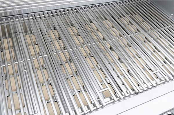 Close-up of a clean, empty stainless steel grate on the Kokomo Grills 26-Inch Built-In Gas Grill (3 Burner), highlighting the bars and ceramic bricks beneath for heat distribution in your outdoor kitchen setup.