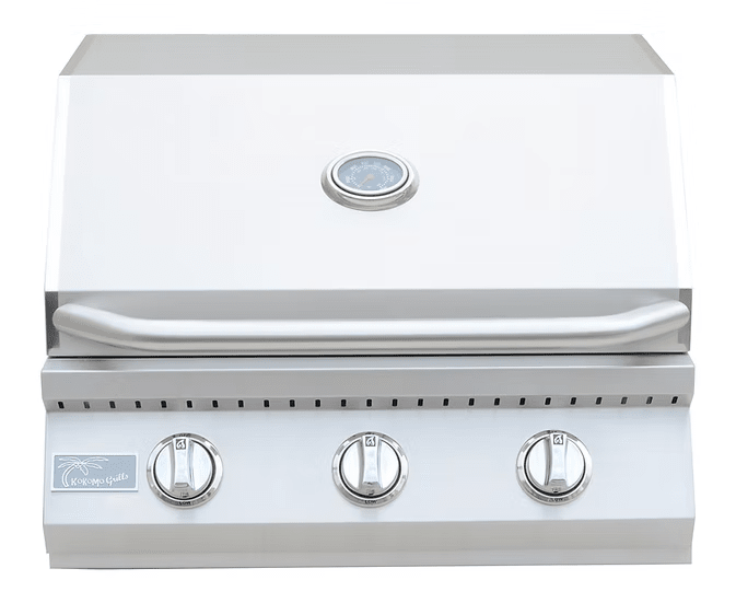 The Kokomo Grills 26-Inch Built-In Gas Grill features three burners, a stainless steel build, closed lid, built-in thermometer, and front control knobs—ideal as a sleek addition to any outdoor kitchen.