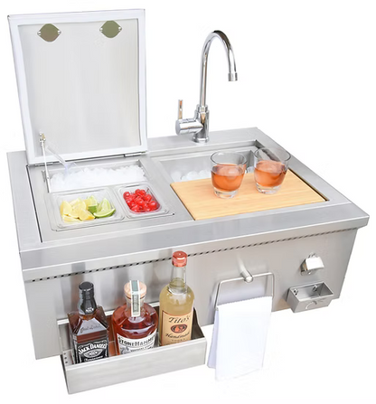 The Kokomo Grills 30” Built-In Bartender Cocktail Station features a sink, ice chest, bottle opener, faucet, paper towel holder, shelves for liquor bottles, space for fruit garnishes and cocktail glasses.