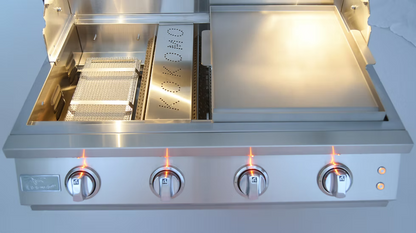 The Kokomo Grills 32-Inch Elite Built-In Gas Grill (4 Burner) by Kokomo Grills includes four lit control knobs, a flat griddle on the right, and grilling and smoking baskets on the left—ideal for outdoor kitchens.