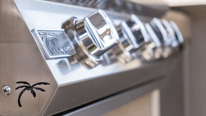 Close-up of sleek stainless steel control knobs with fine metal details and reflective surfaces on the Kokomo Grills 40-Inch Built-In Gas Grill (5 Burner / Back Burner)—a stylish addition to any outdoor kitchen.