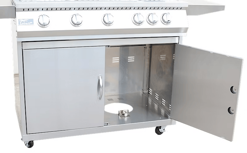 The Kokomo Grills 5 Burner 40-Inch Cart Model BBQ Grill features a stainless steel design, multiple control knobs, locking casters, and an open lower cabinet with a circular propane tank cutout.