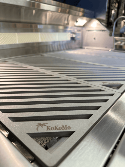 Close-up of Kokomo Grills LuxCut Laser-Cut Culinary Grates for 3, 4, 5 Burner Classic and Pro Grills. The engraved Kokomo Grills logo and precise laser-cut lines highlight their durable stainless steel and sleek, modern design.