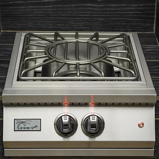 The Kokomo Grills Professional Built-In Power Burner features LED-lit controls, a removable wok grate, and prominent branding on the front—making it ideal for any outdoor kitchen.