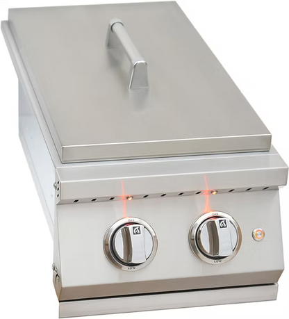 The KoKoMo Grills Professional Double Side Burner by Kokomo Grills features a stainless steel build, removable cover, double burner design, two front control knobs, and orange indicator lights above the knobs.