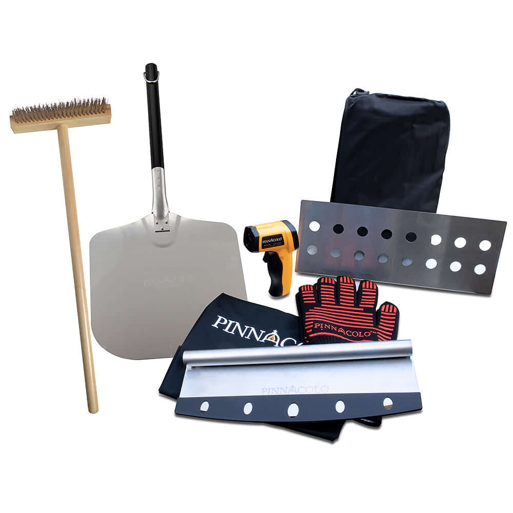 Accessories displayed on a white background, including a cleaning brush, metal pizza peel, infrared thermometer, cutter, heat gloves, metal separator, and protective cover.